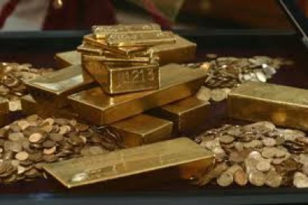 Preţul aurului a scăzut cu 7,7%